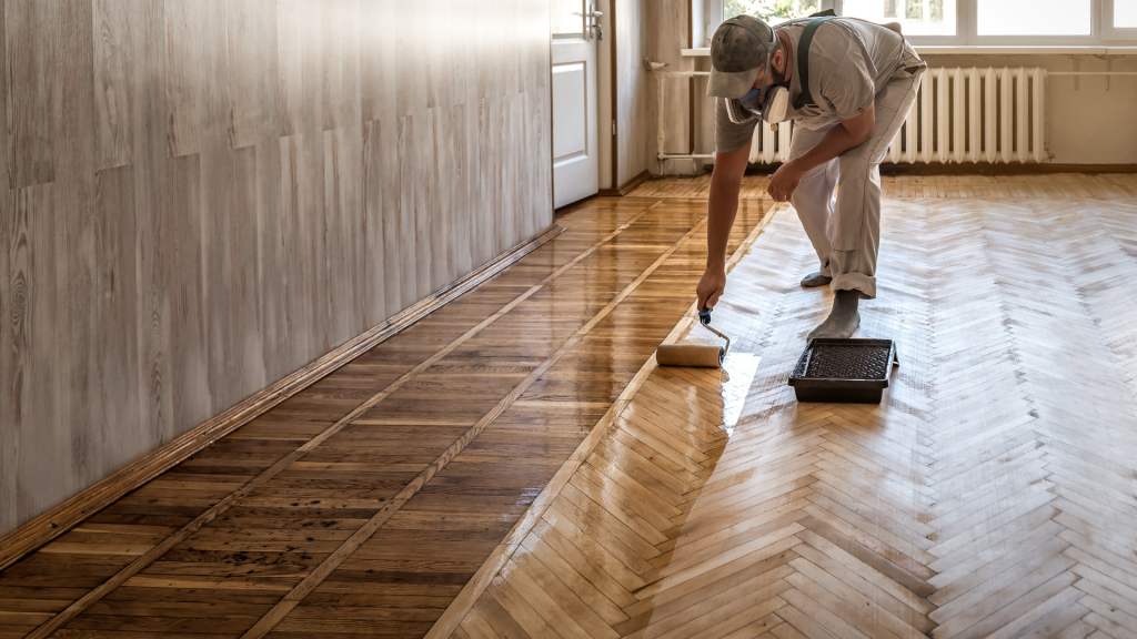man repairing and maintaning floors